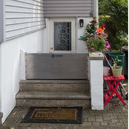 custom flood barrier installed on home door