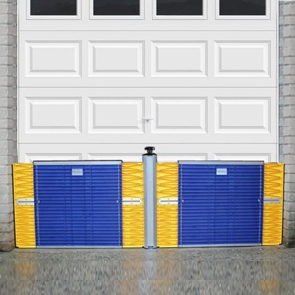 2 flood barriers in front of a garage