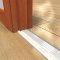 Zero 653 Threshold on a Wooden Floor used with a Wooden Door