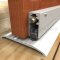 Zero Threshold 655 installed on floor used with a Wooden Door and ADB