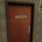 Rockwood Engraved Sign-"RESTROOM" in US3 Finish applied to Interior Door