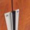 Close Up of Aluminum Meeting Stile Astragal Set with Polypropylene Brush by Pemko on Wooden Doors, Closed