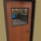 Activar VSIG Vision Lite Kit installed on a wooden door