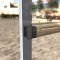 Adams Rite 8600 Series Exit Device installed on aluminum door