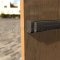 Adams Rite EX80 Exit Device installed on wood dooor