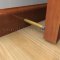 Deltana Extendable Baseboard Door Bumper Applied to a Wooden Door