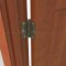 Deltana DTDSB35R4-R, Plain Bearing, Residential Grade, Brass Hinge on a Wooden Door