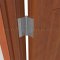 Deltana DTDSB4-RZ, Plain Bearing, Staggered Hole Pattern, Brass Hinge on a Wooden Door