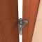 Deltana DTHPS88, Solid Brass, Mounted Hinge Pin Stop on a Wooden Door