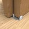 Hettich Grant 118 Floor Guide Installed in Wooden Door Application