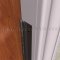 NGP 185P Door Gasket, .875" Aluminum Casing with .25" Wide Polypropylene Pile Seal in DKB Finish applied to frame of door