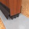 NGP 319ET Door Shoe Sweep in DKB Finish applied to bottom of door