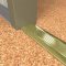 NGP 424 Utility Threshold in BR Finish applied to floor of door entrance