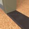 NGP 428E Utility Thresholds in DKB Finish applied to floor of door entrance