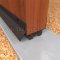NGP 819 Door Shoe Sweep , U Shaped Aluminum Casing with Thermal Break and Rain Drip, Two .5625" Thermoplastic Triple Fin Seals in DKB Finish applied to bottom of door