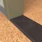 NGP 8475 Utility Threshold in DKB Finish applied to floor of door entrance