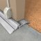 Application Image of NGP 885 Transitional Threshold with Pile Seal in Mill Finish