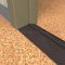 NGP 890 Rabbeted Threshold in DKB Finish with NGP-TPV Seal applied to floor of door entrance