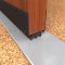 NGP 92T Door Shoe Sweep, U Shaped Aluminum with 2" Kickplate and .6875" Thermoplastic Triple Fin Seal in DKB Finish applied to door bottom