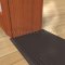Pemko 2266 Cover Plate on Wooden Floor