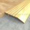 Pemko 168 Gold Anodized Half Threshold On Wooden Floor