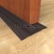 With Utility Threshold as Door Stop and Seal