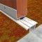 Pemko 246 Carpet Divider on Carpet with Wooden Door