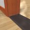 Pemko 254x5FG Dark Bronze Anodized, Thermal Break on Wooden Floor