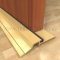 Pemko 277 Gold Threshold installed on wooden Door
