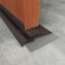 Pemko 66 Dark Bronze Interlocking Angle used with Thresholds on Wooden Door