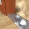 Pemko 154 Stainless Steel Threshold on a Wooden Floor