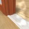 Pemko 271 Threshold on a Wooden Floor with a Wooden Door