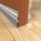 Pemko #405V Clear Anodized Automatic Door Bottom Applied onto Interior Wooden Door, Closed