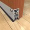 Pemko 4301 Clear Anodized Automatic Door Bottom Semi-Mortised Applied into Wooden Interior Door with Seal Closed