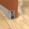 Pemko 4301 automatic door bottom semi-mortised applied onto interior wooden door with epdm seal opened