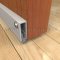 Pemko #SA1 Residential Automatic Door Bottom Surface Applied onto Interior Wooden Door with Seal Open