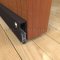 Pemko #SA1 Residential Automatic Door Bottom Surface Applied onto Interior Wooden Door with Seal Open