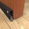 Pemko #SA1 Residential Automatic Door Bottom Surface Applied onto Interior Wooden Door with Seal Closed
