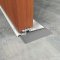 interlocking threshold under a door