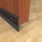 Dark Bronze Door Bottom with Neoprene Seal on Wooden Door