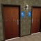 Rockwood Molded Plastic ADA Tactile Sign with Braille, Men's and Handicapped Accessible in Blue finish applied to interior door