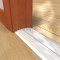Zero 625 Utility Threshold on Wooden Floor