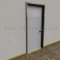 Automatic Door Bottom with Photoluminescent Strip Applied to Metal Door