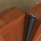 Mortised Aluminum Track with Reversible Neoprene Seal applied on interior wooden double doors as meeting stiles
