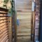 Locinox MAMMOTH180 Gate Closer installed on wooden gate