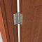 Deltana DTDSB35-R, Plain Bearing, Residential Grade, Brass Hinge on a Wooden Door