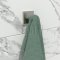Brush Nickel Wall Hook with a towel hanging on it