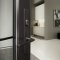 Emtek Contemporary Brass Orion Tubular Entry Set on Door