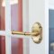 Emtek Heritage Classic Brass Merrimack Lever on Wooden Door