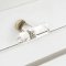 Emtek 86723 Crystal T Bar Cabinet Handle in Satin Bronze Finish applied to cabinet drawer